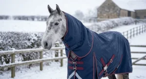 Illustration of a waterproof breathable horse rug featuring a versatile detachable neck cover with secure touch-tape fastenings.
