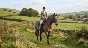 A rider hacking out across the British countryside using an affordable treeless saddle.