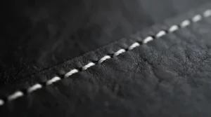Detailed white contrast stitching along the edge of a cost-effective anatomic girth