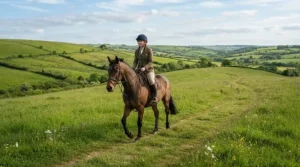 Hacker enjoying a countryside ride using value safety stirrups across British fields.
